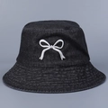 Close-up of black washed denim bucket hat with detailed white bow embroidery - M (56-58cm) / Black