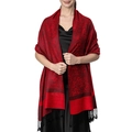 Detail of red and black paisley shawl with fringe on a model in studio lighting - Red Paisley (T003-35)