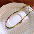 Detailed view of handmade colorful beaded necklace with baroque pearls in ceramic bowl - Multi-colored Beads/Mixed Handmade