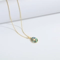 Gouden ketting met ovale hanger, abalone schelp inlegwerk en een kompasster als detail - Stralende Ster XL3497-2