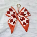 Camellia bow keychain with red and white diamond pattern silk scarf in golden finish - Red Plaid