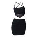 Dettaglio del completo nero a due pezzi in maglia glitterata con spalline incrociate - S / Nero
