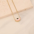 Gold chain necklace with evil eye pendant in pink white and black enamel detail - Pink