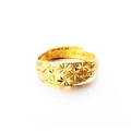 Golden open ring featuring intricate floral and star engravings on a polished surface - Star Engraved (J2293)