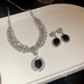 Luxury silver jewelry set featuring black oval stones and sparkling diamond halo accents - Silver 2pcs Set Necklace (130#)