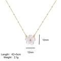 Detail showing white flower pendant in 18k gold plated stainless steel, 12mm size - Shell Necklace