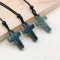 Green moss agate cross necklace with black woven cord and decorative beads - India Agate