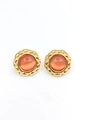 Vintage round gold-plated earrings with salmon cat-eye stone and quilted pattern - Orange