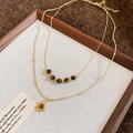 Detail of a vintage double-layer necklace with tiger eye beads and a sun pendant - Double Layer Sun Flower Shape Style (6#)