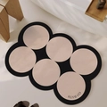 Absorbent bath mat with beige dots on black base and GO BATH text in modern bathroom - Diatom Mud - Star Circle - Coffee