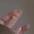 Minimalist gold rose stud earrings for women shown on fingertip for scale - Tulip / Gold
