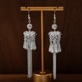 Bohemian silver lotus earrings with long chain tassels on a jewelry display stand - Vintage Fine Lotus Shape Tassel Style (E4207)