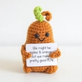 Handmade crochet pear plush doll with positive quote card on clean white background - Brown Pear