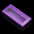 Close-up of purple glitter rectangle eyelash box with transparent window on black background - Dark Purple