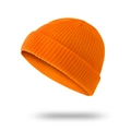 Vibrant orange ribbed knit short beanie hat for men featuring a minimalist urban design - Orange