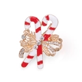 Christmas enamel brooch featuring red and white striped candy canes with a gold bow - Double Candy Canes