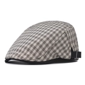 Détail du béret à carreaux britannique montrant la texture beige et noire et la boucle - Réglable / Casquette Ivy à Carreaux-Beige