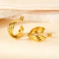 Detailed close-up of triple-layered gold geometric earrings on marble surface - 23mm (PJER372) / Gold
