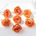 Top view of seven realistic orange artificial silk rose flower heads for DIY crafts - 7 Pcs Pack / Orange