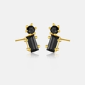 Dettaglio di orecchini a lobo in argento S925 con pietre nere e finitura oro - Argento 925 / Oro 18k (Zircone Nero)