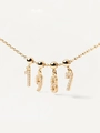 Macro shot of 1997 gold pendant necklace with cubic zirconia pavé and S925 hallmark - Gold Single Necklace