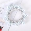 Detail of elegant hair tie with white and light blue pearls woven in silver threads - 5# Silver White Woven Faux Pearl Hair Tie