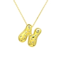 Macro shot of gold bubble initial N pendant necklace with sparkling zircon pavé - Letter N / Gold