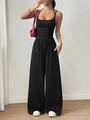 Detail of black halter neck jumpsuit with wide-leg pants showing casual summer style - Navy Blue