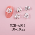 Detail view of 10x10mm silver camellia nail charms with white pearls and sparkling rhinestones - Irregular Flower Cluster Rhinestone Silver Style (AD11)