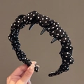 Detail of black polka dot headband featuring anti-slip inner comb teeth for secure styling - Polka Dot High Top / Elegant Black