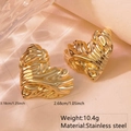 Detailed macro view of gold heart stud earrings with liquid metal textured finish - Stainless Steel Liquid Heart Studs