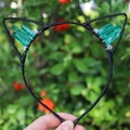 Handmade cat ear headband with green crystal pillars and black ribbon wrap detail - No.80 Grass Green