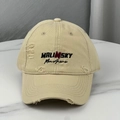 Detail of distressed beige baseball cap with Malinsky embroidery and ripped brim - Beige