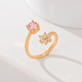 Adjustable gold plated leaf ring featuring a pink round gemstone and zircon flower accent - Pink Round Stone Flower (JZ027)
