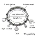 Turkish Evil Eye bracelet in gold finish with dolphin charms and zircon stones - K-Steel Small Fish Style