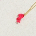 Minimalist gold necklace featuring a polished rose red balloon bear pendant - Small Bear / Rose Red