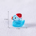 Glow-in-the-dark blue miniature duck with red Santa hat in 1.7cm size for micro landscapes - Blue
