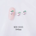 Macro detail of silver peach nail charm with green leaf and purple gradient finish - Silver Gradient Peach (Silver Base) (8335)