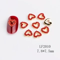 Golden heart nail charms with red rhinestones and bow design, size 7.8x7.5mm - LF2010 Gold Red Rhinestone Hollow Heart