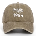 Close-up of Vintage 1984 white embroidery on washed brown cotton baseball cap - Adjustable / Khaki