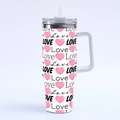 Close-up of 40oz tumbler with pink hearts and black Love pattern on white finish - R170 / 40oz