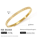 Macro detail of gold plated stainless steel bangle with inlaid sparkling zircon stones - Simple Diagonal Inlaid Bangle (NB-B6368)