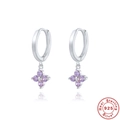 Macro shot of S925 sterling silver clover earrings with sparkling purple crystal stones - 925 Silver / Silver-Purple Zircon