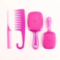 Detail van 4-delige haarborstelset in doorschijnend roze met zilveren glittereffect - Roze - 4-delige set (hol+peddel+haak+staart)