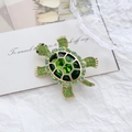 Eleganter Schildkröten-Anstecker mit grünem Kristall und Strass auf Goldlegierung - Xz129 Grün