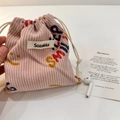 Pink corduroy drawstring pouch with Smile print for organizing jewelry and small items - Corduroy Letter Smiling Face Style / Light Pink