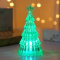 Detail of a glowing green LED Christmas tree light with crystal acrylic texture and star topper - Green (Multi-color Light Small)