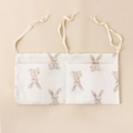 Detail of baby crib storage bag showing soft cotton fabric and rabbit pattern print - Little Rabbit