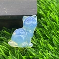 Cute 1.2-inch blue and white natural gemstone cat carving on green grass - Opal