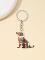 Vista dettagliata del portachiavi a forma di cane in acrilico con motivi di libreria - Cane